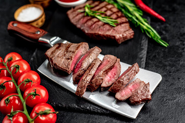 grilled beef steak on stone background