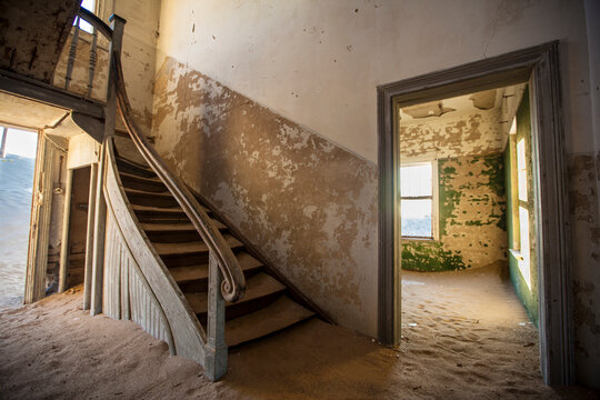 The Kolmanskop settlement where the diamond mine workers lived has been abandoned for over 60 years. Located just outside the city of Luderitz in Namibia.