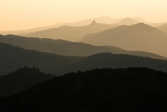 Smoke from the infamous Rim Fire fills the air over the Sierra Nevada mountains as seen from Monitor Pass at sunset near Markleeville, CA.