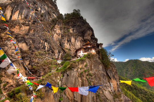 Perched on a precarious cliff edge 900 feet above the valley floor, the Tiger's Nest Monastery (Takshang Goemba) serves as Bhutan's star attraction