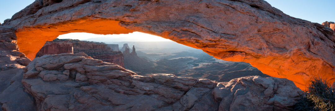 Mesa Arch. As the sun rose over the distant mountains Mesa Arch looked to be on fire.
