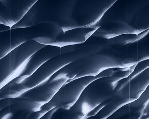 An intimate look at the patterns of melting snow of a cave in the Mt. Rainier wilderness.