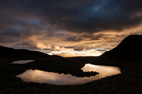 Sunset over a small pond along the Inca Trail, Ecuador.