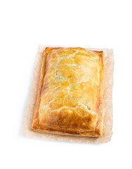 Homemade salmon wellington with spinach and mushrooms isolated on white