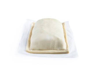 Raw salmon wellington with spinach and mushrooms isolated on white. Ready to bake