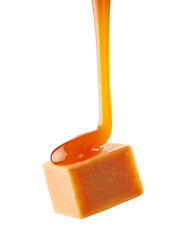caramel sauce flowing on flying caramel candy