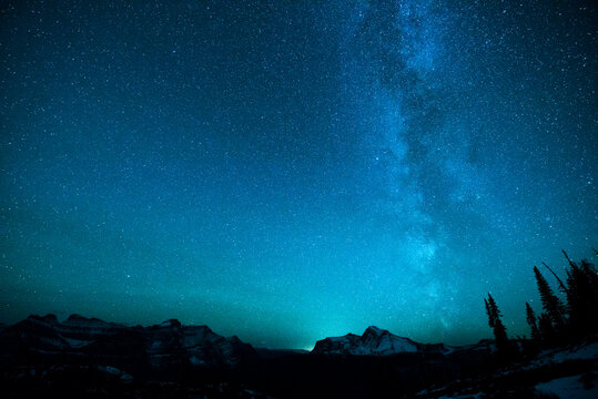 Winter night sky over Glacier National Park, Montana.