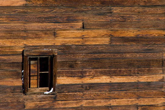 Close-up of a barn wall in a snow-covered field near Boulder, Colorado