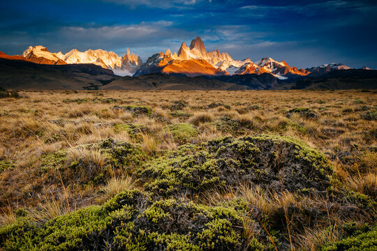 First light hits Cerro Torre and Mount Fitz Roy in Los Glacieres National Park, Argentina.