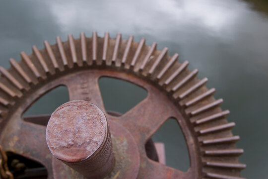 A rusted iron crank near a lake on Deadman's Loop hike in the Rocky Mountains near Aspen, Colorado