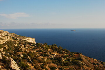 Fototapeta na wymiar View from Dingli Cliffs in Malta island with the small noname island in background