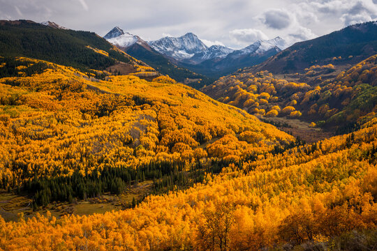 A storm clears over Capitol Peak in the fall near Aspen, Colorado.
