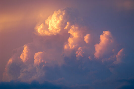 Sunset and storm clouds above Denver, Colorado during a summer thunderstorm.