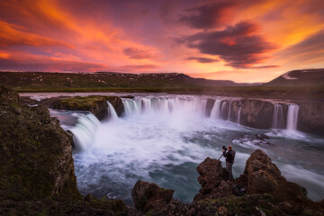 Colorful Skies Over Stunning Waterfalls