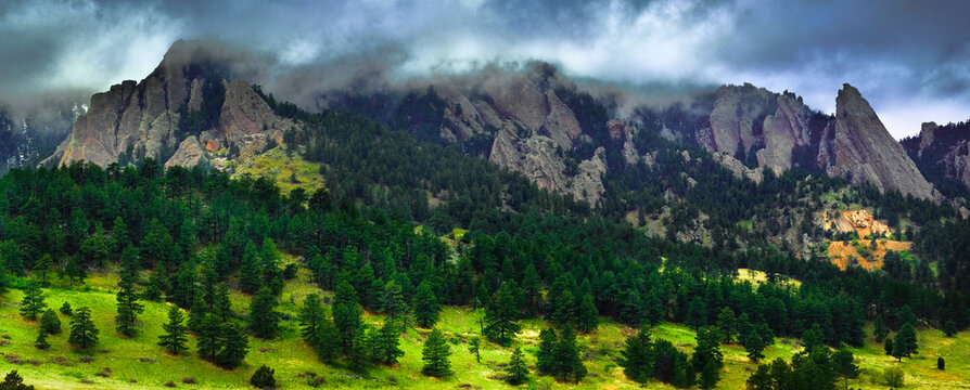 Boulder, CO: A storm hangs around town for the day, sweeping across the rocky tops of the Flatirons.