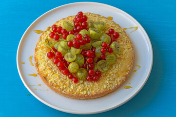 Homemade gooseberry red currant cake isolated