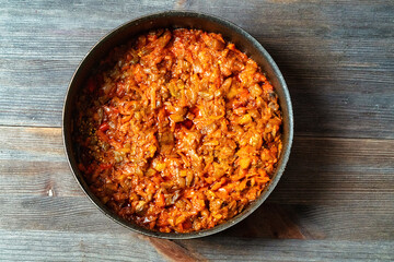 fried squash caviar in a black skillet