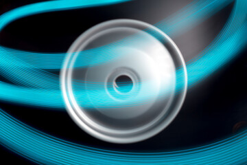 long exposure photography in motion spinning car titanium rims in blurry light