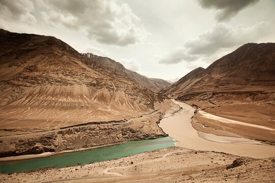 The confluence of the Indus river and the Zanskar river in the high desert of Ladakh, India