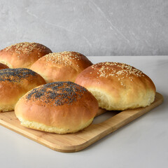 baked buns with sesame and poppy