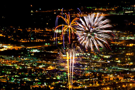 View of the Boulder, Colorado July 4th fireworks display from the top of the Flatirons.