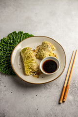 Leaves of Savoy cabbage stuffed with vegetables. Asian cabbage rolls. Vegan. Top view.