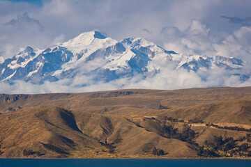 Mt. Illampu and Mt. Ancohuma in the Cordillera Real mountain range as seen from Lake Titicaca, Bolivia