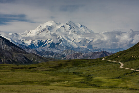 Mount McKinley, known locally as Denali, or The High One, soars above the clouds in Denali National Park, Alaska.