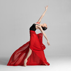 Young beautiful skinny ballerina is posing in studio © Alexander Y