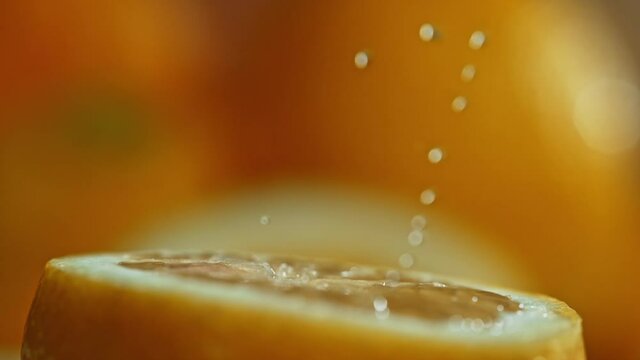 Squizzing Lemon by Hand SLow Motion Macro Close Up