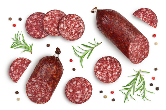 Smoked sausage salami with slices isolated on white background with clipping path and full depth of field. Top view. Flat lay