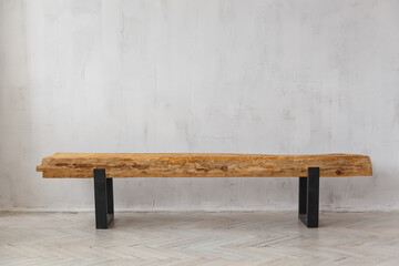 A wooden stand made of restored wooden beams