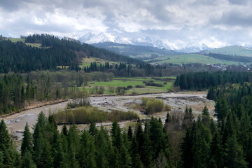 View of spring Tatra mountains and Białka river.