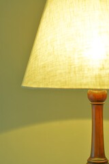 dim lighting room of the mahogany antique lamp. 

This expensive furniture is made in England. 
blurred background soft focus image.	
