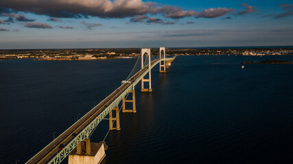 Fototapeta na wymiar Late Evening Aerial Views of Historic Newport Suspension Bridge - East Passage Narragansett Bay - Rhode Island
