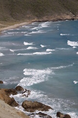 waves crashing on rocks