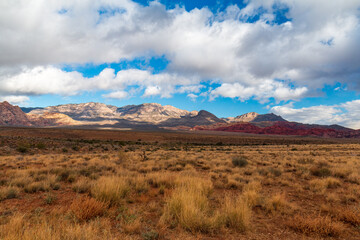 Late Morning Sun and Clouds on La Madre Mountain Range Wilderness, Calico Hills and White Rock Hills from Lower Red Rock Parking Area