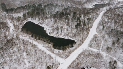 Aerial of Frozen Fresh Water Pond - Snowy Hanging Rock Ponds - Hanging Rock, Wayne National Forest - Ohio