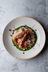 Top view of expensive risotto with big prawns