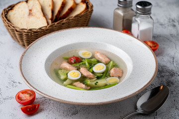 Diet and very light soup with salmon and broccoli in vegetable broth
