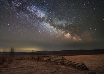 Starry milky way sky over farm field. - 432057986