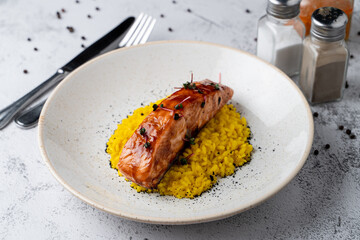 Fusion cuisine: lemon creamy risotto with roasted teriyaki sauce