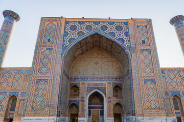 Fototapeta na wymiar The Registan square architecture in Samarkand, Uzbekistan. Registan is famous for its beautiful architecture and colorful mosaic decoration.