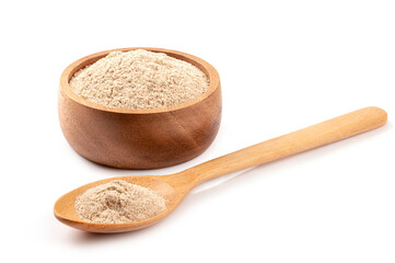 Ginger powder in wooden bowl and spoon on white background.