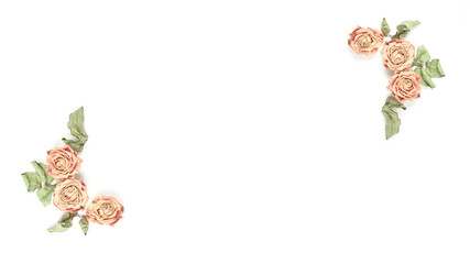 floral banner concept. roses flowers close-up on a white background. minimalistic wedding composition with place for text. flat lay, top view, copy space