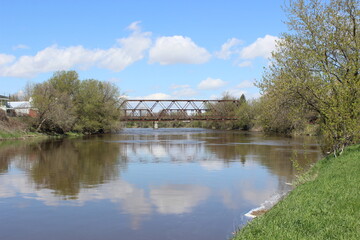 Reflection of a bridge on a river