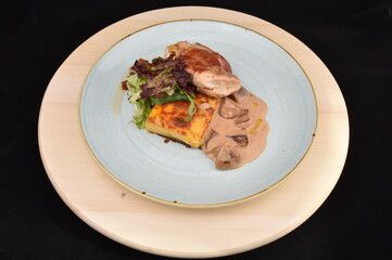 Gourmet Venison  with salad and mushrooms sauce