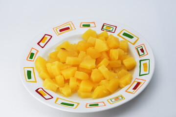 pieces of pineapple on a plate
