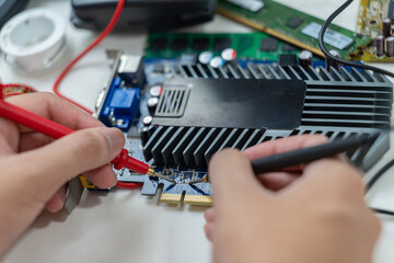 The service technician check a RAM in his hands