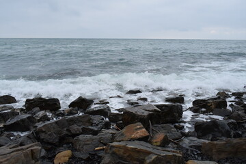 Big waves on the Black Sea. Stone beach. The photo was taken near the resort town of Anapa.